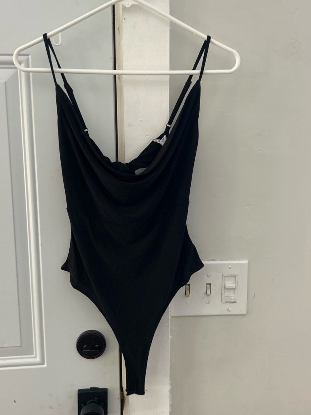 women’s black body suit